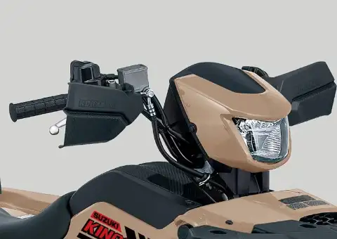 Styrmonterad strålkastare på Suzuki KingQuad